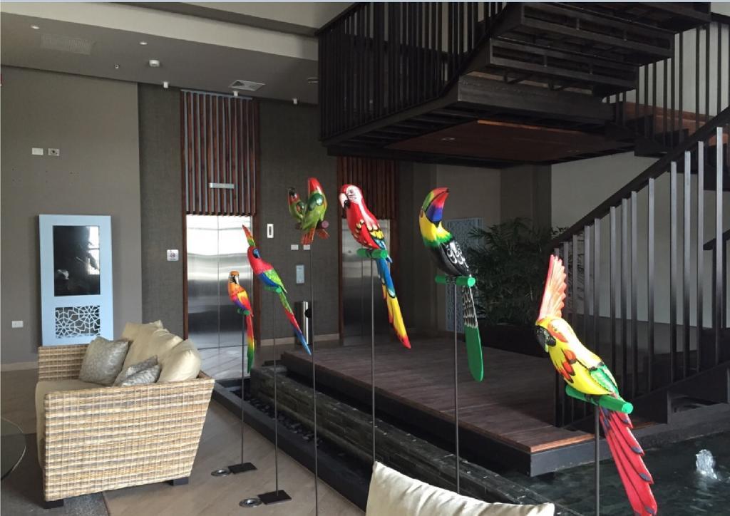 Ghl Hotel Montería Exteriör bild Parrots at the lobby
