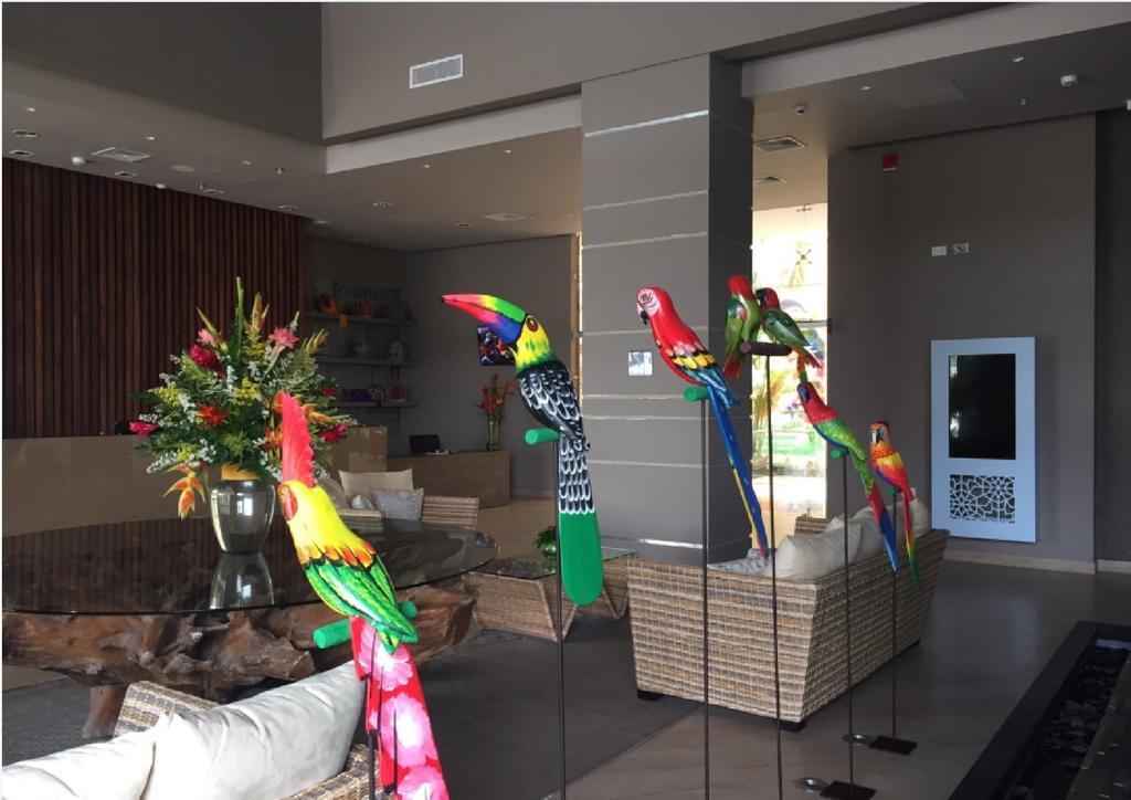Ghl Hotel Montería Exteriör bild Parrots at the lobby