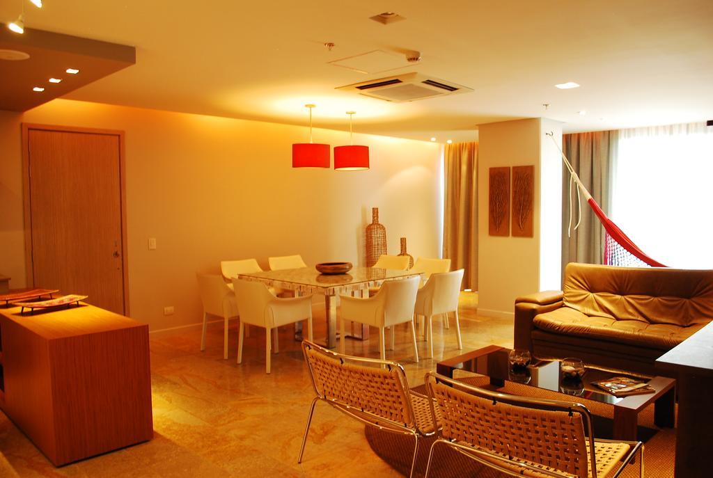 Ghl Hotel Montería Rum bild A living room in a serviced apartment in Madrid, Spain