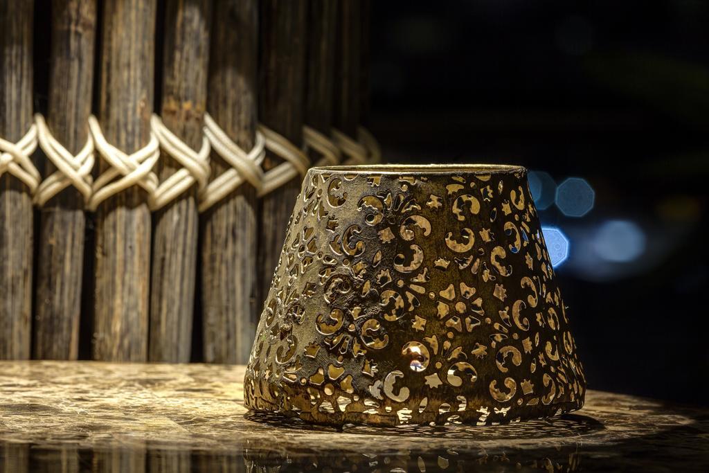 Ghl Hotel Montería Exteriör bild A candle holder